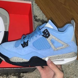 University Blue Jordan 4's
